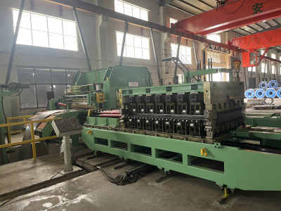 1650型汽车高强板整平横切(摆剪)机组